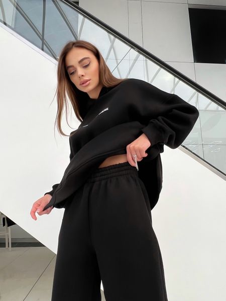 A warm tracksuit with a hoodie and joggers