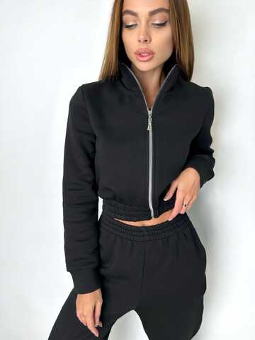 Warm women's tracksuit with joggers and a cropped jacket with a