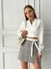 Cropped satin shirt with lacing in ivory color