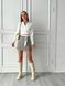 Cropped satin shirt with lacing in ivory color