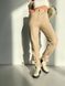 Жіночі брюки з еко шкіри на затяжках рівного покрою. 31470701 фото 1