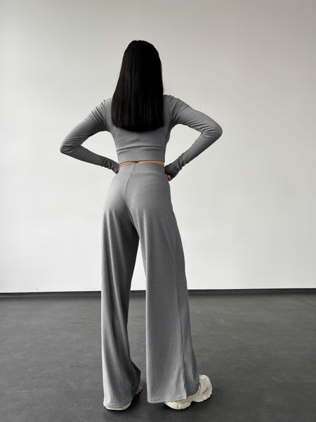 Жіночий легкий трикотажний костюм в рубчик з топом та брюками палаццо. 31651201 фото