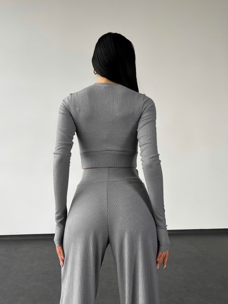 Жіночий легкий трикотажний костюм в рубчик з топом та брюками палаццо. 31651201 фото