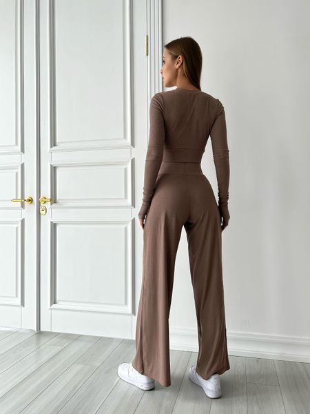 Жіночий легкий трикотажний костюм в рубчик з топом та брюками палаццо. 31650901 фото