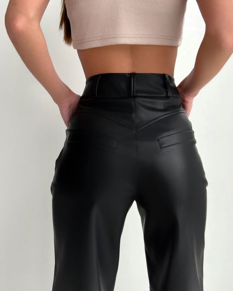 Жіночі брюки з еко шкіри на затяжках рівного покрою. 31470201 фото