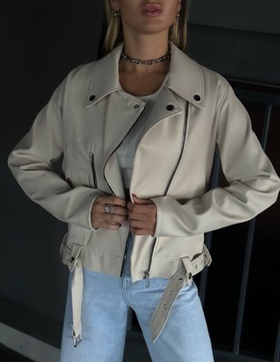 Women's leather jacket with high quality eco-leather suede with metal zipper and buttons in ivory color.