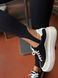 Black knitted stirrup leggings