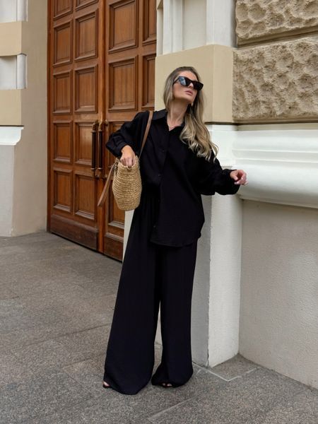 Women's suit &mdash; black shirt and trousers