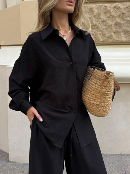 Women's suit &mdash; black shirt and trousers