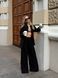 Women's suit &mdash; black shirt and trousers