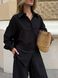 Women's suit &mdash; black shirt and trousers