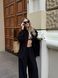Women's suit &mdash; black shirt and trousers